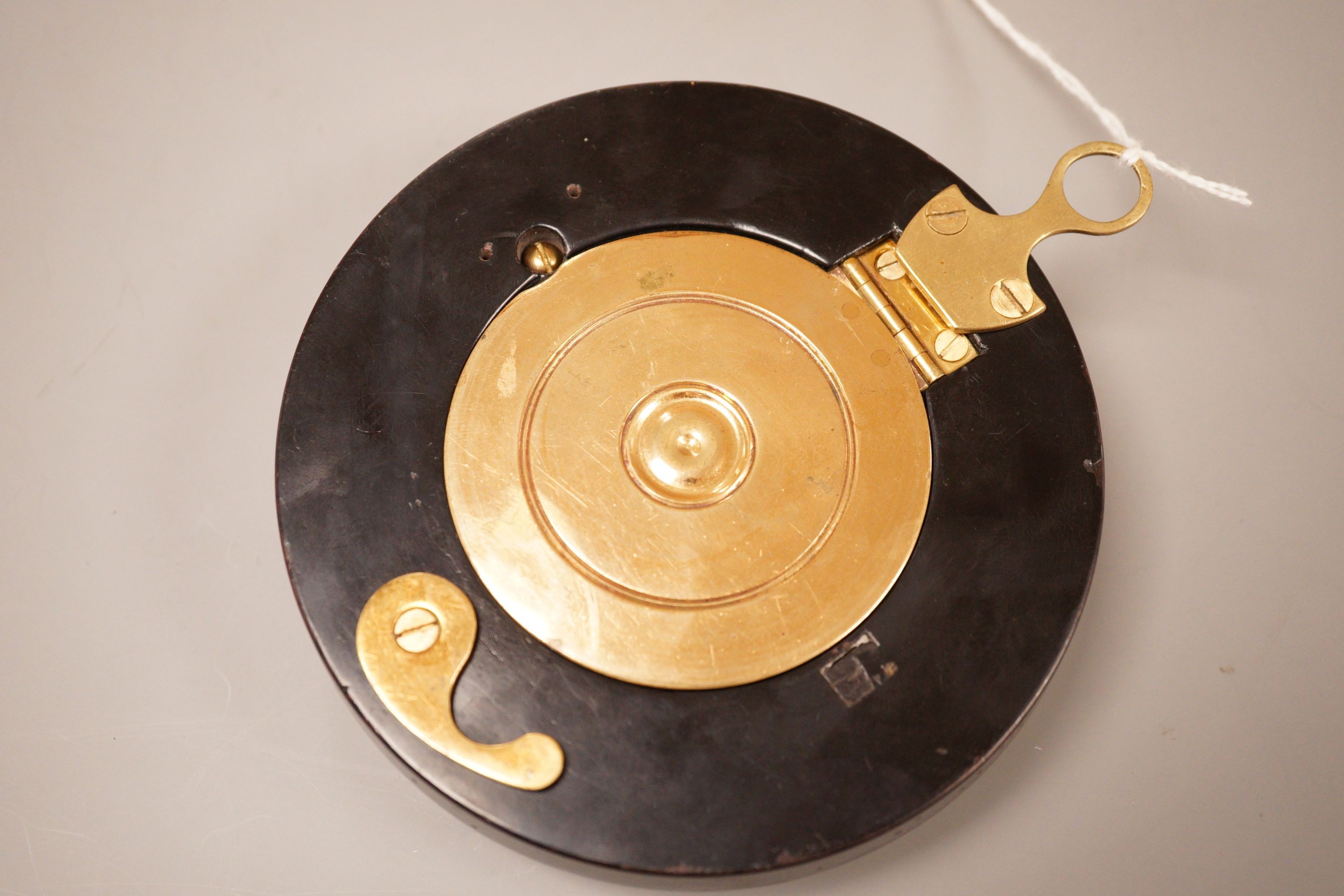 A George III brass and ebonised wood sedan timepiece, 1£cm diameter